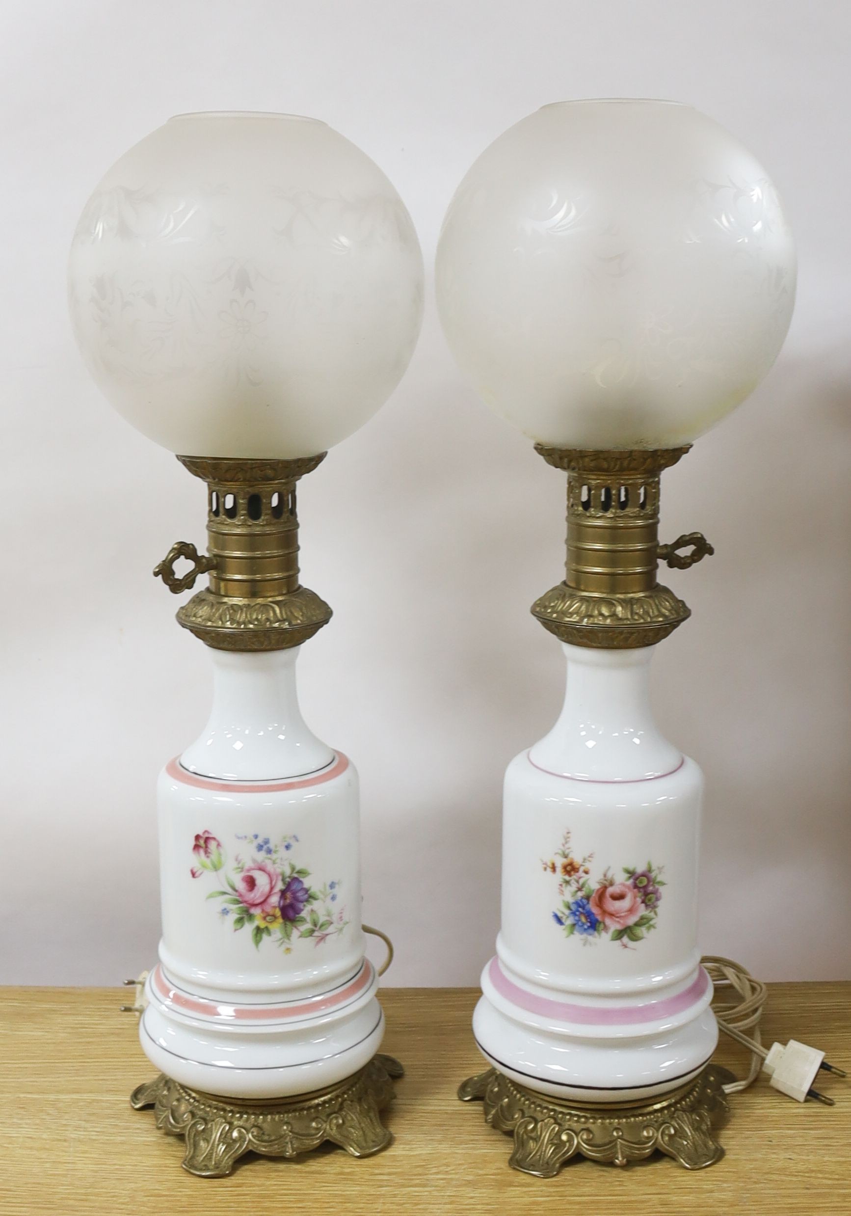 A pair of Napoleon III porcelain converted oil lamps. 59cm